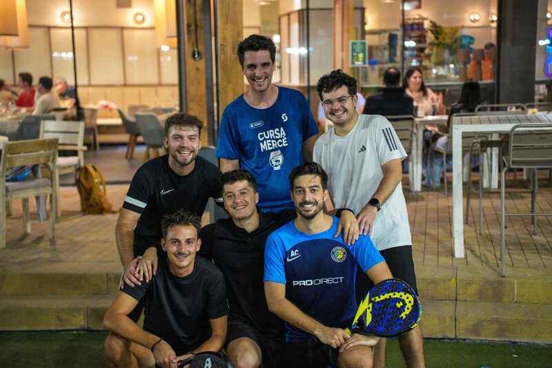 Group of friends smiling together after their padel matches
